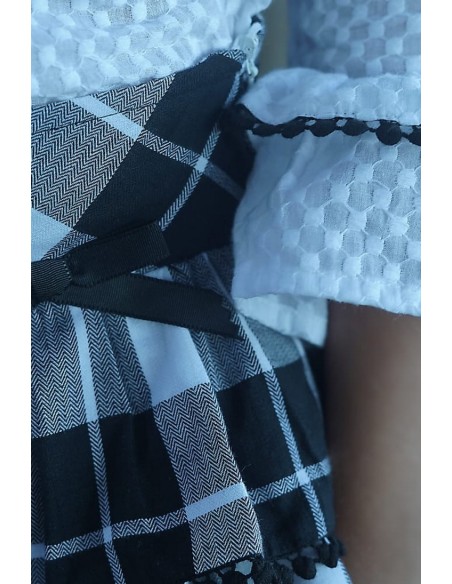 CONJUNTO NIÑA BLUSA Y BOMBACHO COLECCIÓN NATALIE, CUADROS NEGROS.NOMA FERNÁNDEZ. INVIERNO 23.