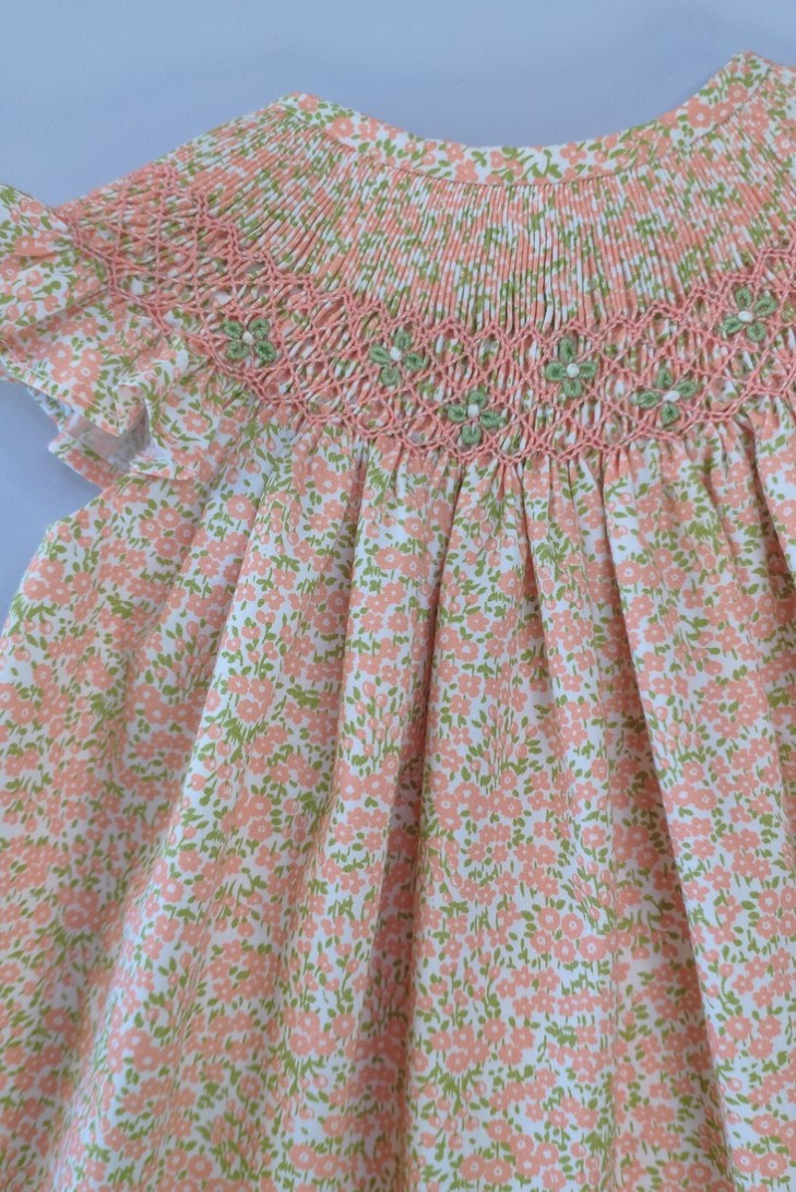 VESTIDO PUNTO SMOCK FLORES, NARANJA. VERANO 24.