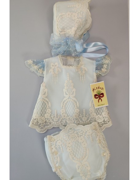 CONJUNTO BLUSA, CUBREPAÑAL Y CAPOTA.