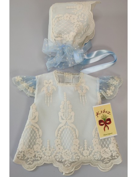 CONJUNTO BLUSA, CUBREPAÑAL Y CAPOTA.