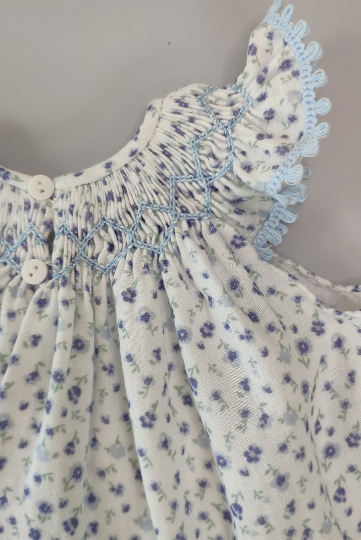 JESUSITO PUNTO SMOCK BÁMBULA "DAISY", FLORES AZUL. VERANO 24.