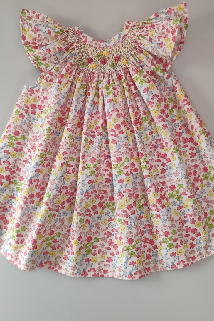 VESTIDO PUNTO SMOCK FLORES,MULTICOLOR. VERANO 24.