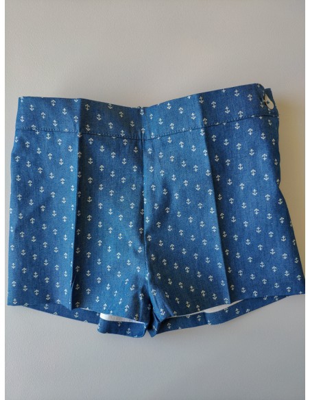Conjunto niño formado por camisa estampado rayas y pantalón short en tela vaquera con decoración de anclas