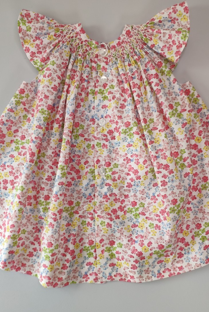 VESTIDO PUNTO SMOCK FLORES,MULTICOLOR. VERANO 24.