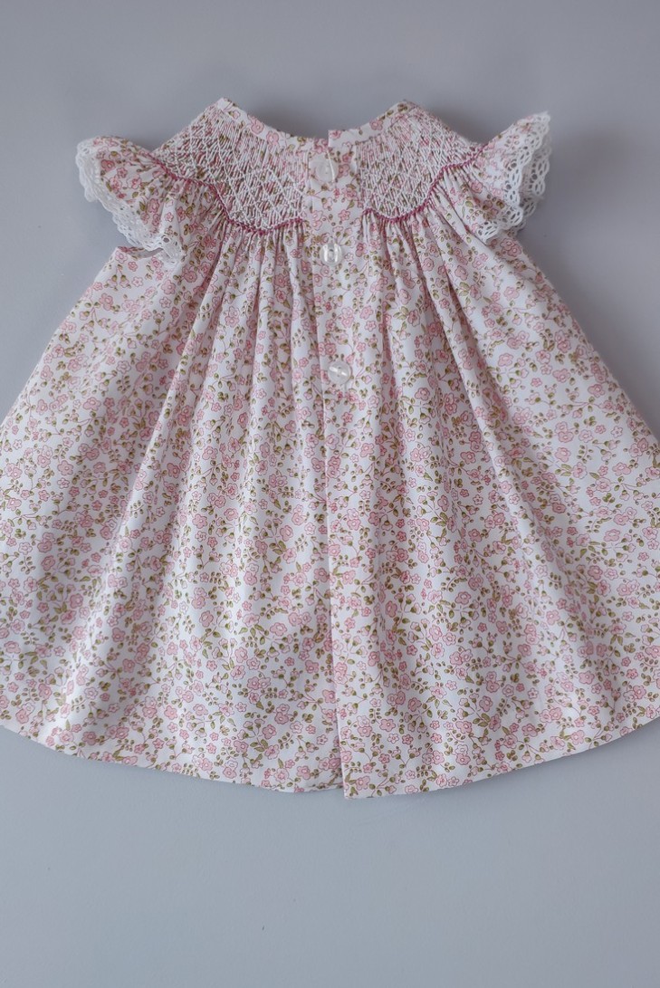 VESTIDO PUNTO SMOCK FLORES,ROSA. VERANO 24.