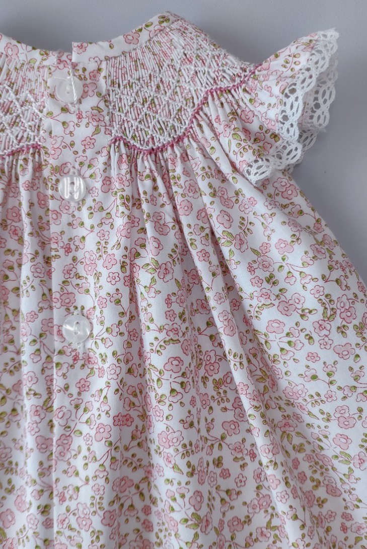 VESTIDO PUNTO SMOCK FLORES,ROSA. VERANO 24.
