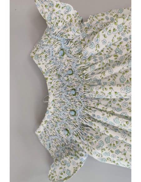 PELELE UNISEX PUNTO SMOCK FLORES, AZUL. VERANO 24.