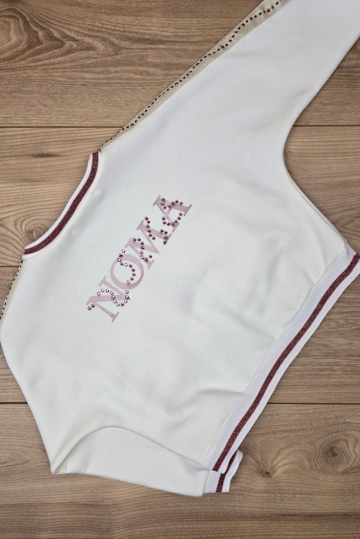 CONJUNTO NIÑA BOMBACHO Y SUDADERA COLECCIÓN TRENTO DE NOMA FERNÁNDEZ, CRUDO/ROSA. INVIERNO 24.