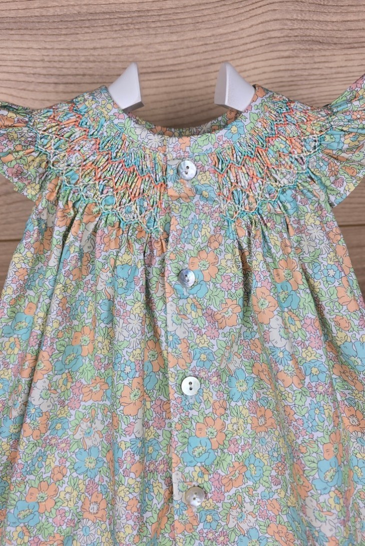 JESUSITO PUNTO SMOCK ROSITA DE TARTALETA, TURQUESA. VERANO 25.