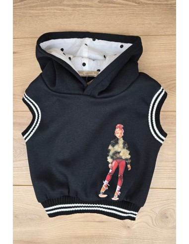 CONJUNTO NIÑA BOMBACHO (FALDA), BLUSA Y CHALECO DELIA DE NOMA FERNÁNDEZ, TOPOS NEGROS. INVIERNO 25.