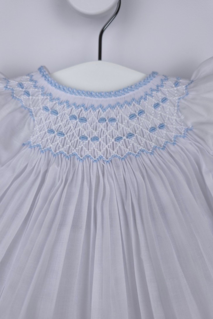 JESUSITO PUNTO SMOCK. BATISTA BLANCA-AZUL. VERANO 26.