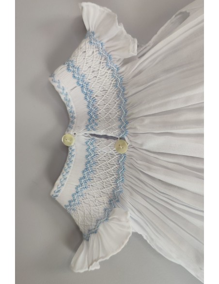 RANITA UNISEX BORDADO PUNTO SMOCK. BATISTA BLANCA-AZUL. VERANO 25.