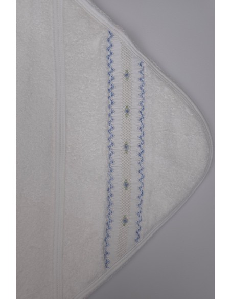 CAPA DE BAÑO PUNTO SMOCK FLOR, CELESTE. INVIERNO 26.