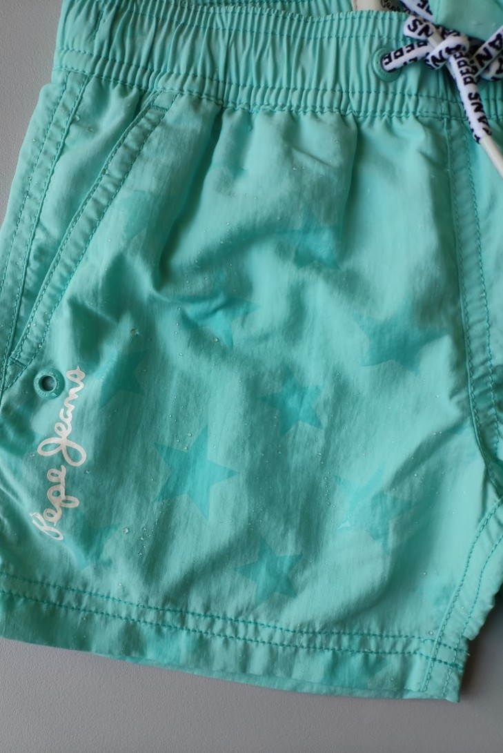 BAÑADOR NIÑO ESTRELLAS TURQUESA DE PEPE JEANS.
