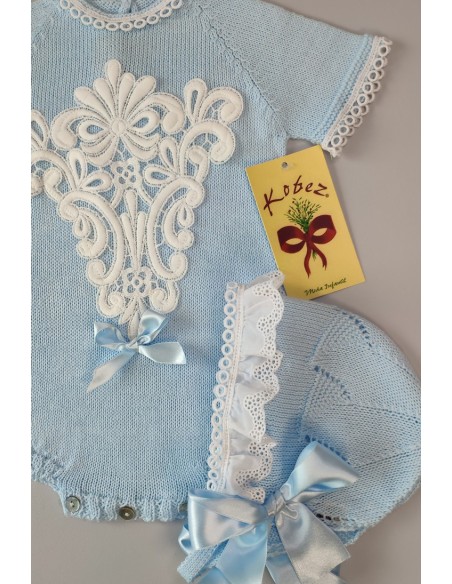 PELELE DE PUNTO UNISEX, CELESTE. INCLUYE CAPOTA. VERANO