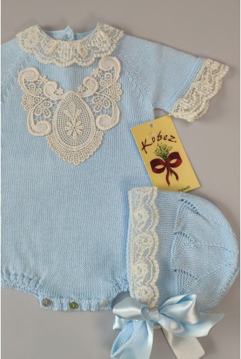 PELELE DE PUNTO UNISEX, CELESTE. INCLUYE CAPOTA. VERANO 2