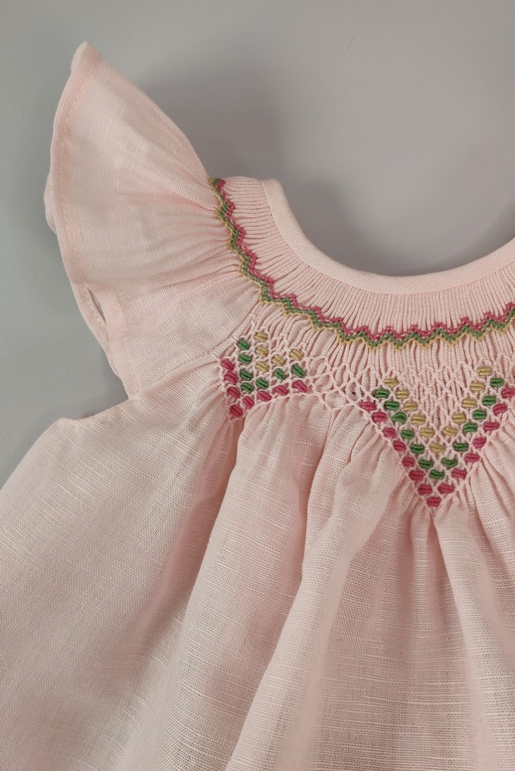 JESUSITO BORDADO SMOCK ROSA/FLORES. VERANO 21