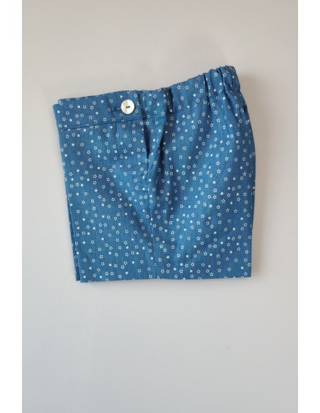Conjunto niño formado por camisa estampado rayas y pantalón short en tela vaquera con decoración de anclas