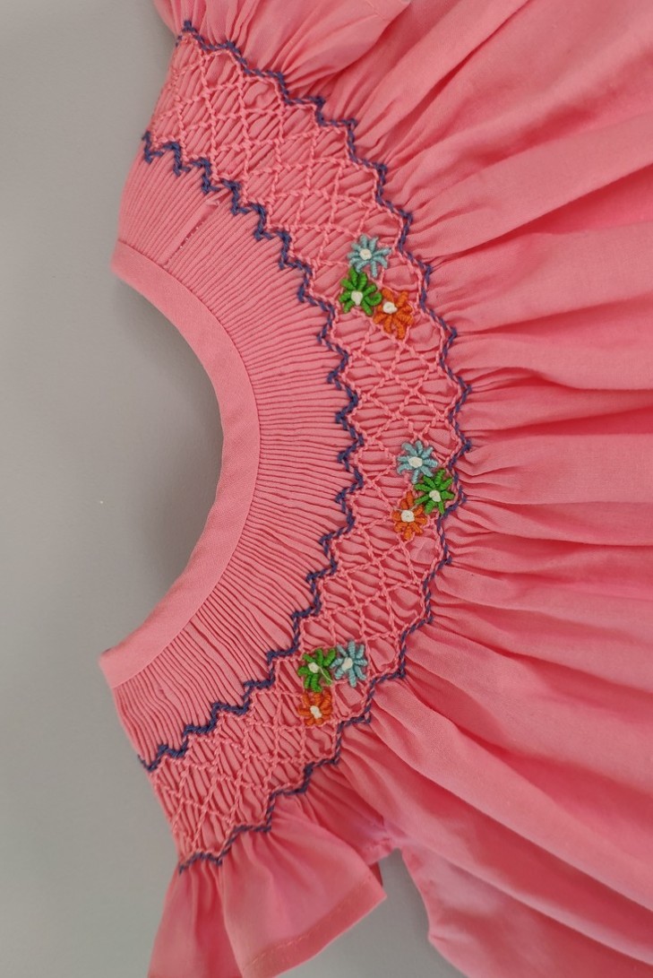 JESUSITO PUNTO SMOCK ROSA/ANIMALES. VERANO 22.