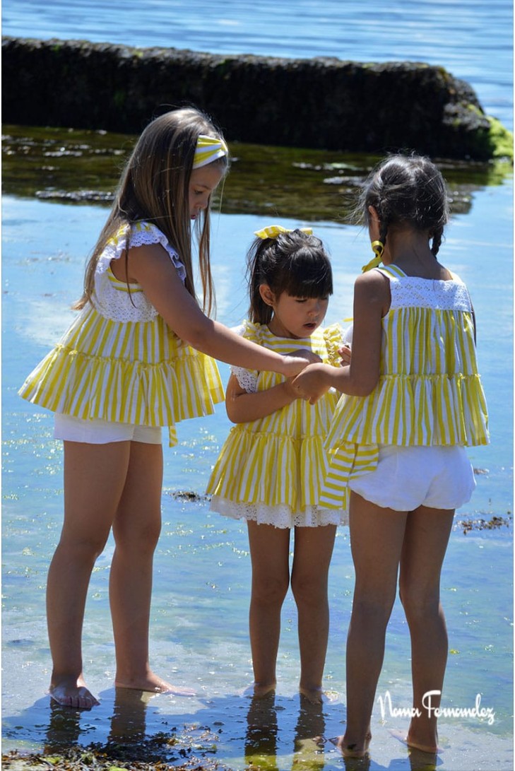 CONJUNTO NIÑA BLUSÓN Y SHORT COLECCIÓN LEMON, AMARILLO/BLANCO.NOMA FERNÁNDEZ. VERANO 23.